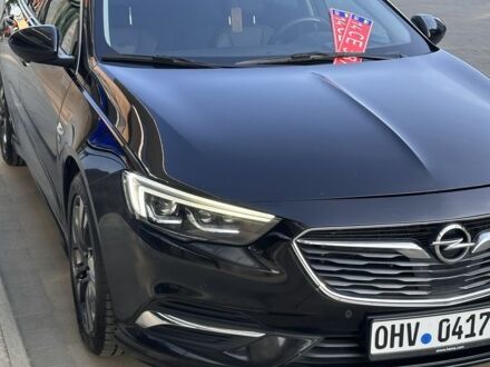 Черный Опель Инсигния, объемом двигателя 2 л и пробегом 196 тыс. км за 17000 $, фото 1 на Automoto.ua