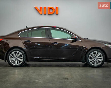 Коричневый Опель Инсигния, объемом двигателя 2 л и пробегом 220 тыс. км за 10097 $, фото 3 на Automoto.ua