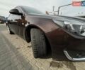 Коричневый Опель Инсигния, объемом двигателя 2 л и пробегом 140 тыс. км за 13800 $, фото 16 на Automoto.ua