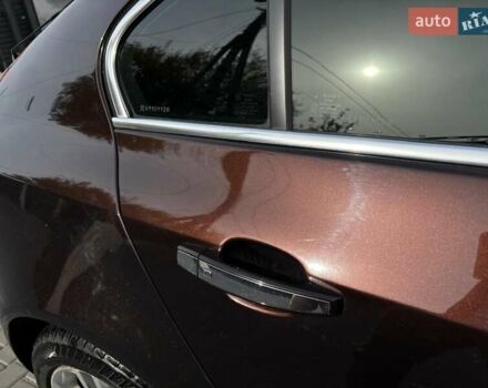 Коричневый Опель Инсигния, объемом двигателя 2 л и пробегом 140 тыс. км за 13800 $, фото 7 на Automoto.ua