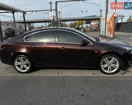 Коричневый Опель Инсигния, объемом двигателя 2 л и пробегом 140 тыс. км за 13800 $, фото 5 на Automoto.ua