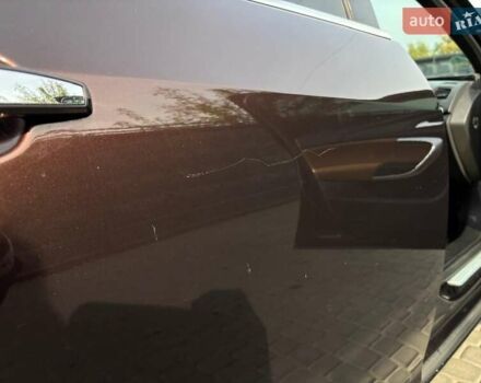 Коричневый Опель Инсигния, объемом двигателя 2 л и пробегом 140 тыс. км за 13800 $, фото 10 на Automoto.ua