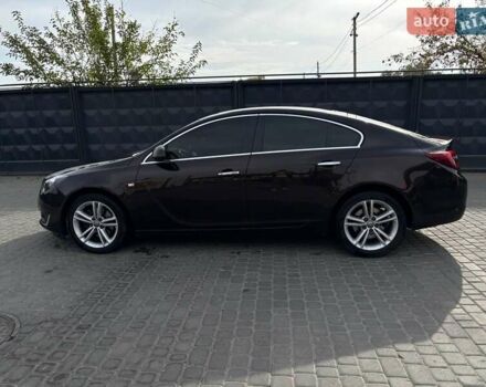 Коричневый Опель Инсигния, объемом двигателя 2 л и пробегом 140 тыс. км за 13800 $, фото 3 на Automoto.ua