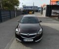 Коричневый Опель Инсигния, объемом двигателя 2 л и пробегом 140 тыс. км за 13800 $, фото 6 на Automoto.ua