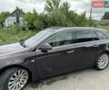 Коричневый Опель Инсигния, объемом двигателя 2 л и пробегом 235 тыс. км за 6500 $, фото 6 на Automoto.ua