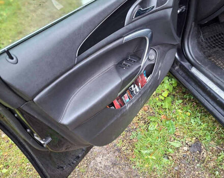 Коричневый Опель Инсигния, объемом двигателя 1.96 л и пробегом 310 тыс. км за 7999 $, фото 6 на Automoto.ua