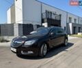 Коричневий Опель Інсігнія, об'ємом двигуна 2 л та пробігом 184 тис. км за 7590 $, фото 1 на Automoto.ua
