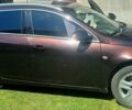 Коричневий Опель Інсігнія, об'ємом двигуна 2 л та пробігом 250 тис. км за 6997 $, фото 1 на Automoto.ua