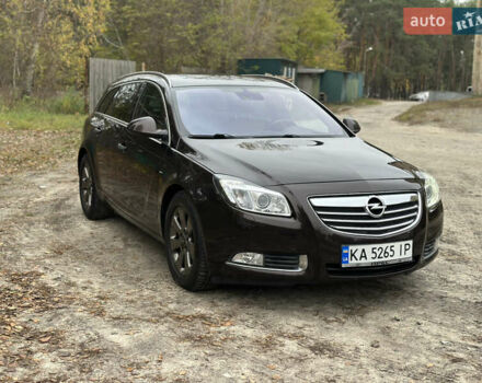 Коричневий Опель Інсігнія, об'ємом двигуна 1.96 л та пробігом 220 тис. км за 9800 $, фото 6 на Automoto.ua