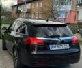 Коричневий Опель Інсігнія, об'ємом двигуна 2 л та пробігом 264 тис. км за 7600 $, фото 4 на Automoto.ua