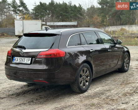 Коричневый Опель Инсигния, объемом двигателя 1.96 л и пробегом 220 тыс. км за 9800 $, фото 7 на Automoto.ua