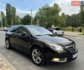 Коричневый Опель Инсигния, объемом двигателя 2 л и пробегом 246 тыс. км за 6500 $, фото 1 на Automoto.ua