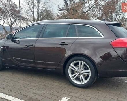 Коричневий Опель Інсігнія, об'ємом двигуна 1.96 л та пробігом 249 тис. км за 8500 $, фото 6 на Automoto.ua