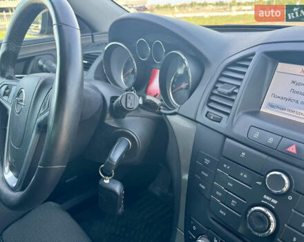 Коричневий Опель Інсігнія, об'ємом двигуна 1.96 л та пробігом 225 тис. км за 8700 $, фото 5 на Automoto.ua