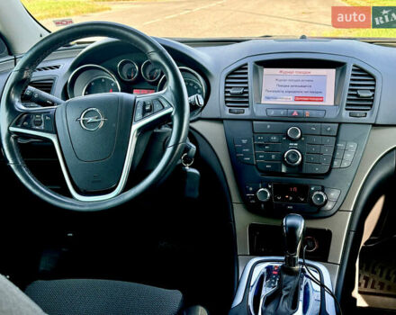 Коричневий Опель Інсігнія, об'ємом двигуна 1.96 л та пробігом 225 тис. км за 8700 $, фото 6 на Automoto.ua