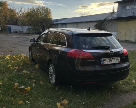 Коричневый Опель Инсигния, объемом двигателя 1.96 л и пробегом 235 тыс. км за 9500 $, фото 2 на Automoto.ua