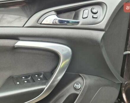 Коричневый Опель Инсигния, объемом двигателя 1.96 л и пробегом 114 тыс. км за 11600 $, фото 14 на Automoto.ua