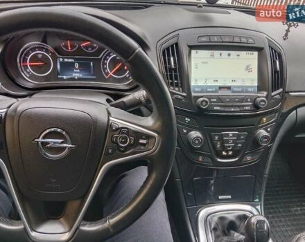 Коричневый Опель Инсигния, объемом двигателя 1.96 л и пробегом 210 тыс. км за 13300 $, фото 3 на Automoto.ua