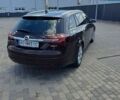 Коричневый Опель Инсигния, объемом двигателя 1.6 л и пробегом 145 тыс. км за 12100 $, фото 1 на Automoto.ua