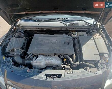 Коричневый Опель Инсигния, объемом двигателя 1.96 л и пробегом 193 тыс. км за 13700 $, фото 2 на Automoto.ua