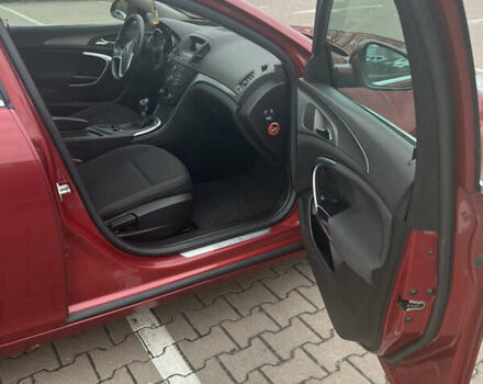 Опель Инсигния 2010 в Житомире на Automoto.ua Красный Опель Инсигния, объемом двигателя 2 л и пробегом 275 тыс. км за 7500 $, фото 8 на Automoto.ua