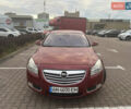 Опель Инсигния 2010 в Житомире на Automoto.ua Красный Опель Инсигния, объемом двигателя 2 л и пробегом 275 тыс. км за 7500 $, фото 1 на Automoto.ua