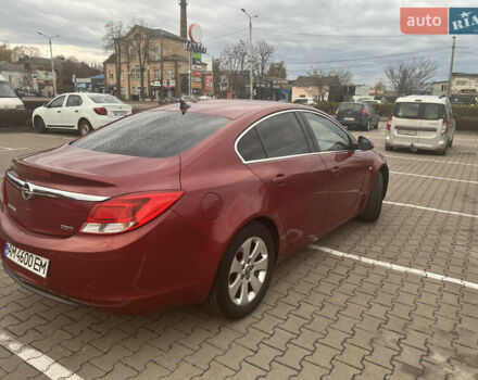 Опель Инсигния 2010 в Житомире на Automoto.ua Красный Опель Инсигния, объемом двигателя 2 л и пробегом 275 тыс. км за 7500 $, фото 4 на Automoto.ua