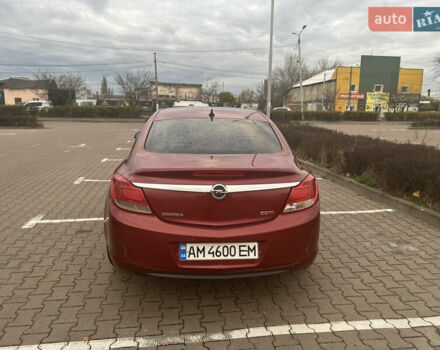 Опель Инсигния 2010 в Житомире на Automoto.ua Красный Опель Инсигния, объемом двигателя 2 л и пробегом 275 тыс. км за 7500 $, фото 5 на Automoto.ua