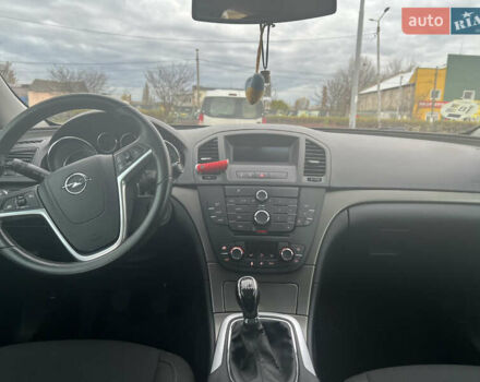 Опель Инсигния 2010 в Житомире на Automoto.ua Красный Опель Инсигния, объемом двигателя 2 л и пробегом 275 тыс. км за 7500 $, фото 10 на Automoto.ua