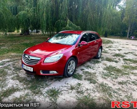 Червоний Опель Інсігнія, об'ємом двигуна 2 л та пробігом 221 тис. км за 7000 $, фото 2 на Automoto.ua