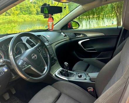 Червоний Опель Інсігнія, об'ємом двигуна 2 л та пробігом 221 тис. км за 7000 $, фото 7 на Automoto.ua