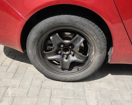 Красный Опель Инсигния, объемом двигателя 1.96 л и пробегом 217 тыс. км за 7400 $, фото 9 на Automoto.ua