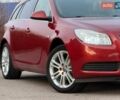 Красный Опель Инсигния, объемом двигателя 1.8 л и пробегом 185 тыс. км за 7450 $, фото 1 на Automoto.ua