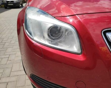 Красный Опель Инсигния, объемом двигателя 1.96 л и пробегом 217 тыс. км за 7400 $, фото 1 на Automoto.ua