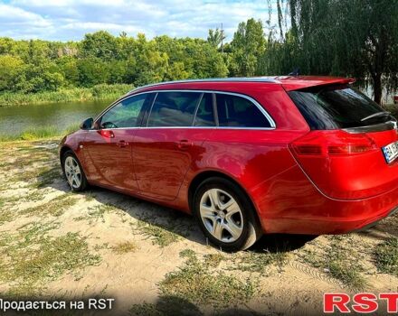 Червоний Опель Інсігнія, об'ємом двигуна 2 л та пробігом 221 тис. км за 7000 $, фото 3 на Automoto.ua