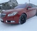 Красный Опель Инсигния, объемом двигателя 2 л и пробегом 204 тыс. км за 8000 $, фото 1 на Automoto.ua