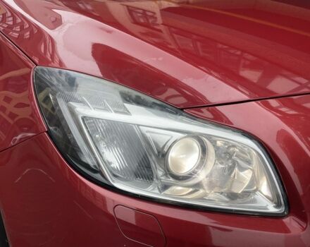 Червоний Опель Інсігнія, об'ємом двигуна 2 л та пробігом 210 тис. км за 6750 $, фото 5 на Automoto.ua