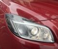 Червоний Опель Інсігнія, об'ємом двигуна 2 л та пробігом 210 тис. км за 6750 $, фото 5 на Automoto.ua