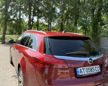 Червоний Опель Інсігнія, об'ємом двигуна 2 л та пробігом 230 тис. км за 7500 $, фото 5 на Automoto.ua