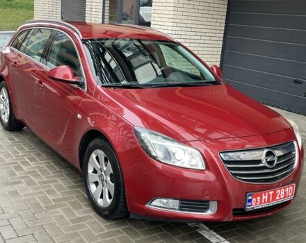 Червоний Опель Інсігнія, об'ємом двигуна 2 л та пробігом 210 тис. км за 6750 $, фото 3 на Automoto.ua