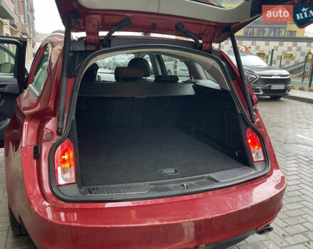 Червоний Опель Інсігнія, об'ємом двигуна 2 л та пробігом 210 тис. км за 6750 $, фото 54 на Automoto.ua