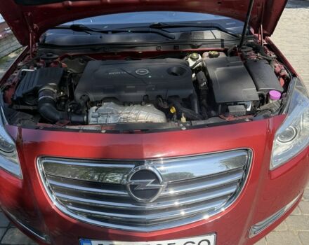 Червоний Опель Інсігнія, об'ємом двигуна 2 л та пробігом 230 тис. км за 7500 $, фото 9 на Automoto.ua