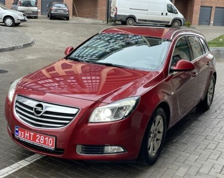 Червоний Опель Інсігнія, об'ємом двигуна 2 л та пробігом 210 тис. км за 6750 $, фото 1 на Automoto.ua