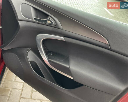 Червоний Опель Інсігнія, об'ємом двигуна 2 л та пробігом 210 тис. км за 6750 $, фото 46 на Automoto.ua