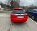 Красный Опель Инсигния, объемом двигателя 1.96 л и пробегом 240 тыс. км за 5999 $, фото 1 на Automoto.ua