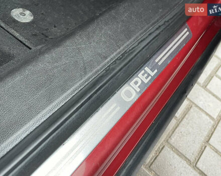 Червоний Опель Інсігнія, об'ємом двигуна 2 л та пробігом 210 тис. км за 6750 $, фото 45 на Automoto.ua