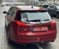 Червоний Опель Інсігнія, об'ємом двигуна 2 л та пробігом 210 тис. км за 6750 $, фото 7 на Automoto.ua
