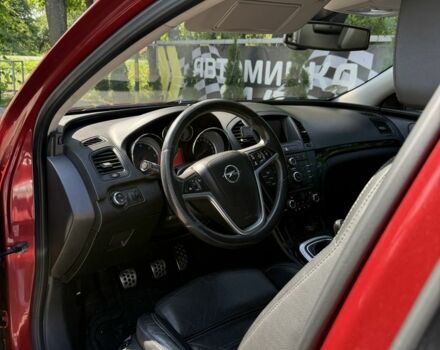 Червоний Опель Інсігнія, об'ємом двигуна 2 л та пробігом 230 тис. км за 7500 $, фото 6 на Automoto.ua