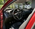 Червоний Опель Інсігнія, об'ємом двигуна 2 л та пробігом 230 тис. км за 7500 $, фото 6 на Automoto.ua