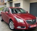 Червоний Опель Інсігнія, об'ємом двигуна 2 л та пробігом 210 тис. км за 6750 $, фото 1 на Automoto.ua